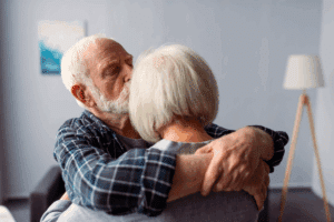 older couple embracing