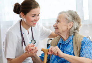 elderly woman and caregiver