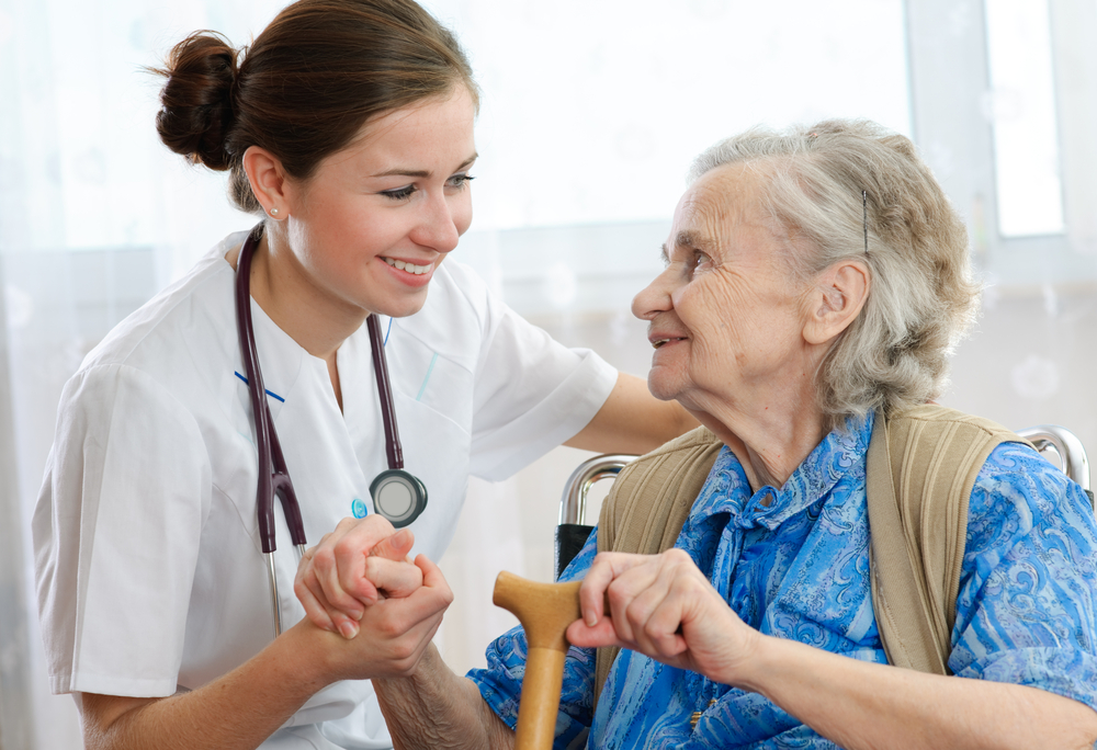 elderly woman and caregiver