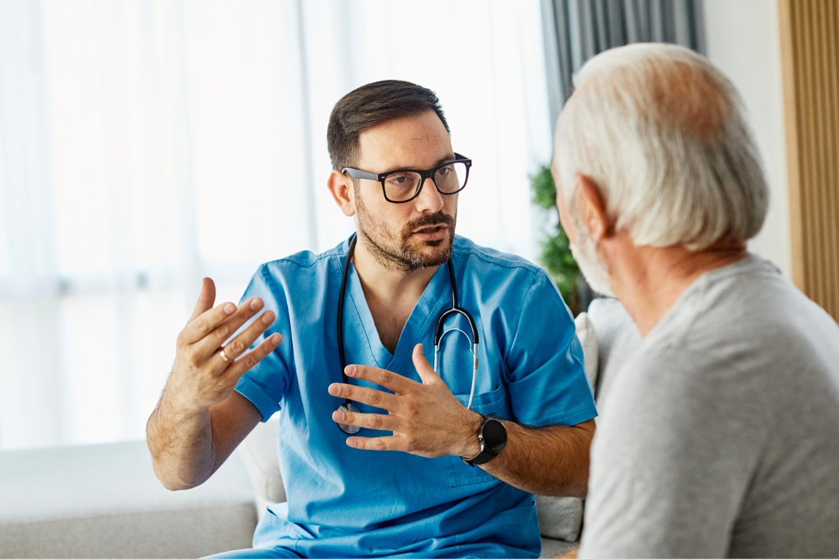 Doctor speaking with an elderly patient