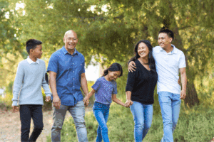 Asian American family walking hand in hand