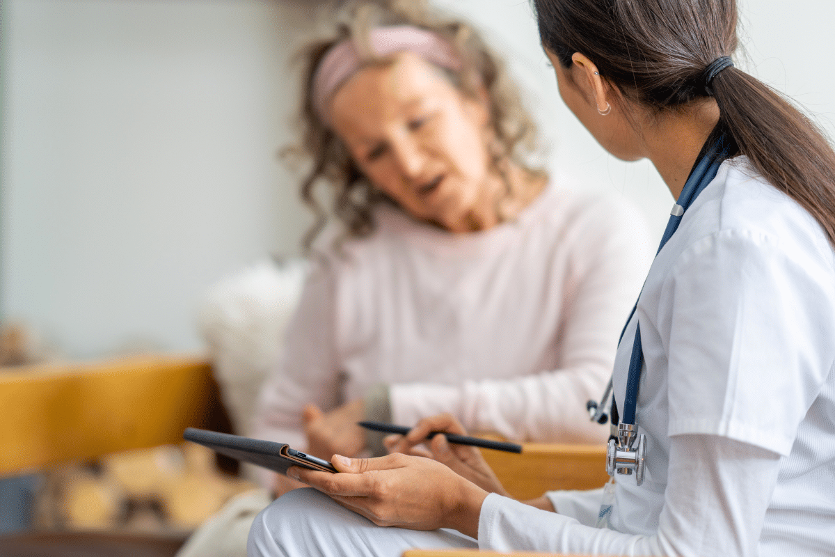 Older Adult Speaking with a Nurse
